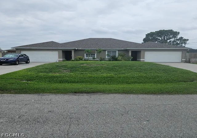 Photo 1 of Sale Pending at 2405 2407 Paul Ave S, Lehigh Acres, FL 33973 | MLS# 2026025192 | Listing updated on 2026-07-12