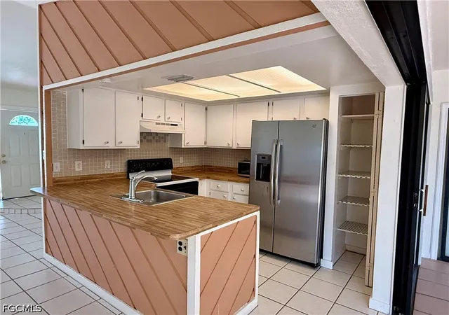Photo 4 of Single family home for sale at 1204 SE 15th Street, Cape Coral, FL 33990 | MLS# 2026025298 | Listing updated on 2026-07-05