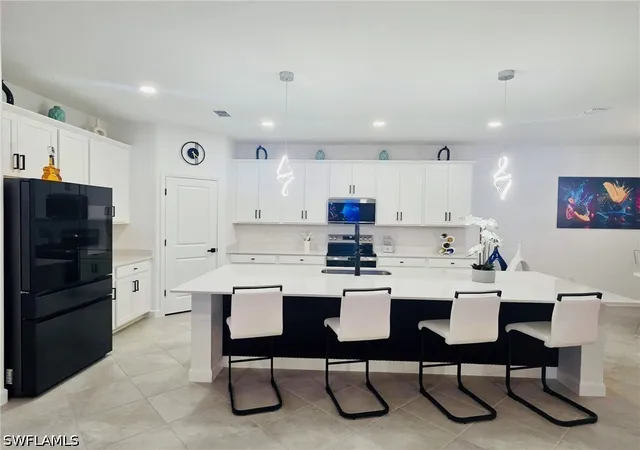Photo 3 of Single family home for sale at 9230 Aqua Overlook Ct, Lehigh Acres, FL 33936 | MLS# 226021649 | Listing updated on 2026-07-31