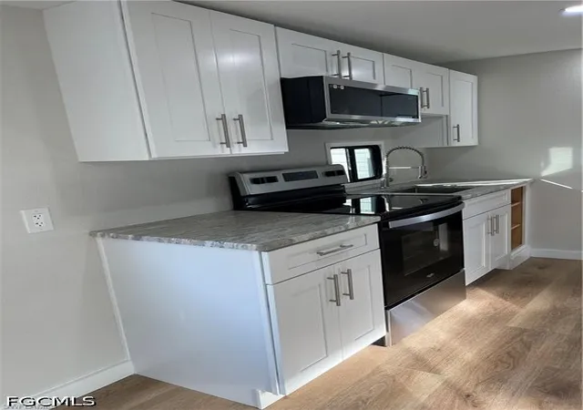 2nd image of 5753 Pink Panther Dr, Fort Myers, FL 33908 | MLS# 2026025568