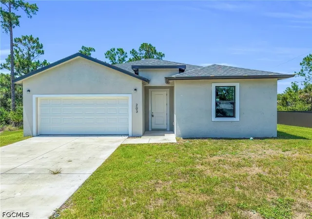 Photo 1 of Single family home for sale at 203 E 17th Street, Lehigh Acres, FL 33972 | MLS# 2026025639 | Listing updated on 2026-06-10