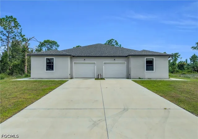 Photo 1 of Multi family home for sale at 1054 Ainsworth St E, Lehigh Acres, FL 33974 | MLS# 2026025641 | Listing updated on 2026-06-10