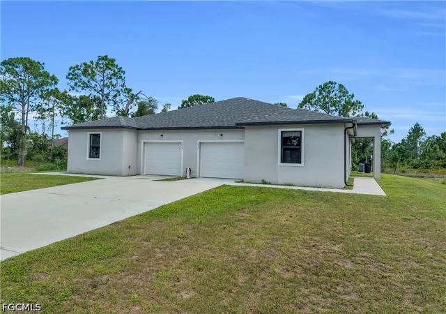 Photo 3 of Multi family home for sale at 1054 Ainsworth St E, Lehigh Acres, FL 33974 | MLS# 2026025641 | Listing updated on 2026-06-10