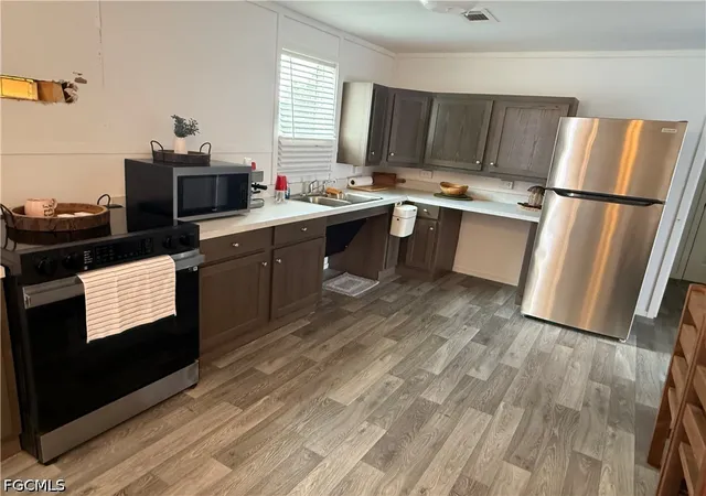 Photo 4 of Manufactured home for sale at 8165 Heck Dr, North Fort Myers, FL 33917 | MLS# 2026025908 | Listing updated on 2026-06-26