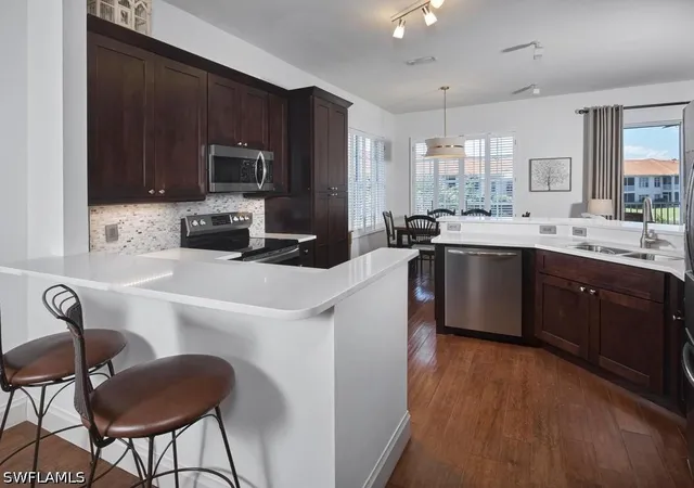 Listing Photo 4 - Condo for sale in building located at 970 Egrets Run, Naples, FL 34108 - Unit #201