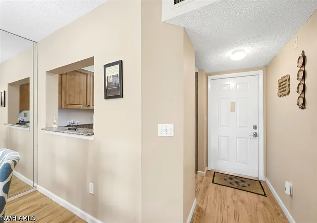 Listing Photo 2 - Condo for sale in building located at 7406 Lake Breeze Dr, Fort Myers, FL 33907 - Unit #218