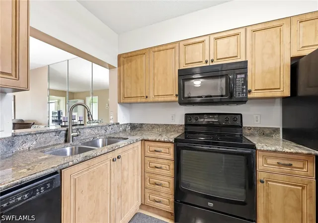 Listing Photo 3 - Condo for sale in building located at 7406 Lake Breeze Dr, Fort Myers, FL 33907 - Unit #218