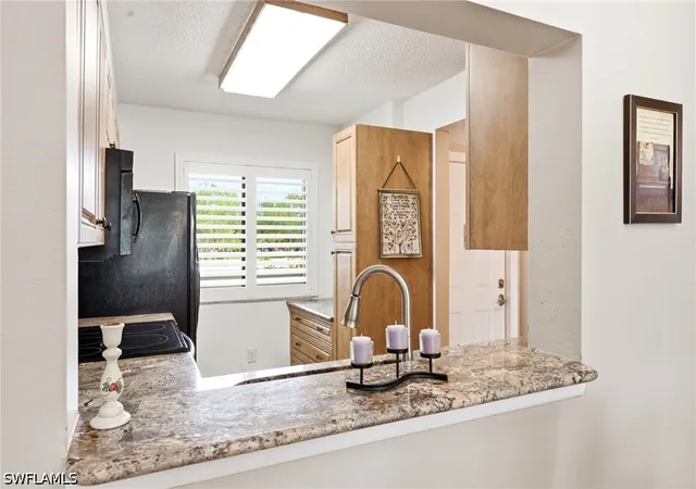 Listing Photo 4 - Condo for sale in building located at 7406 Lake Breeze Dr, Fort Myers, FL 33907 - Unit #218
