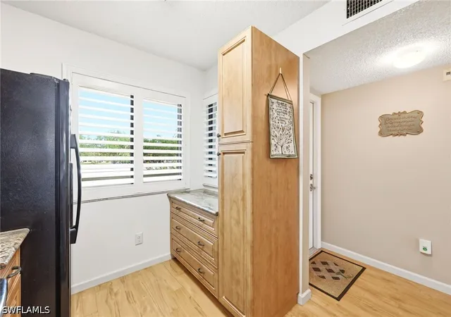 Listing Photo 5 - Condo for sale in building located at 7406 Lake Breeze Dr, Fort Myers, FL 33907 - Unit #218