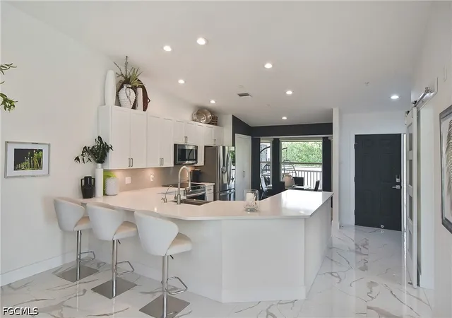 Listing Photo 4 - Condo for sale in building located at 10235 Bismark Palm Wy, Fort Myers, FL 33966 - Unit #1521
