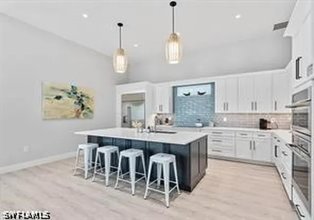 Listing Photo 5 - Condo for sale in building located at 515 91st Ave N, Naples, FL 34108 - Unit #2