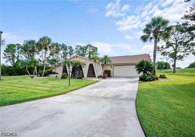 1st image of 711 Mirror Lakes Dr, Lehigh Acres, FL 33974 | MLS# 2026026402