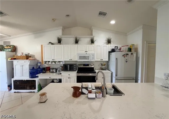 Photo 3 of Single family home for sale at 1621 SW 14th Terrace, Cape Coral, FL 33991 | MLS# 2026026487 | Listing updated on 2026-07-31