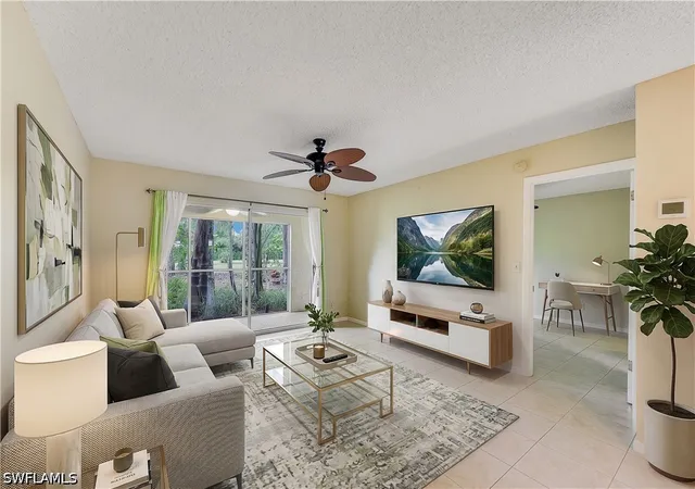 Listing Photo 4 - Condo for sale in building located at 1702 Kings Lake Blvd, Naples, FL 34112 - Unit #102