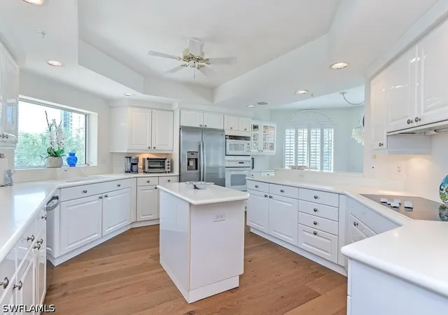 Listing Photo 4 - Condo for sale in building located at 7425 Pelican Bay Blvd, Naples, FL 34108 - Unit #206