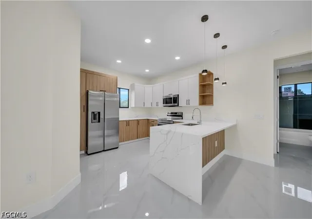 5th image of 4016 9Th St Sw, Lehigh Acres, FL 33976 | MLS# 2026027523