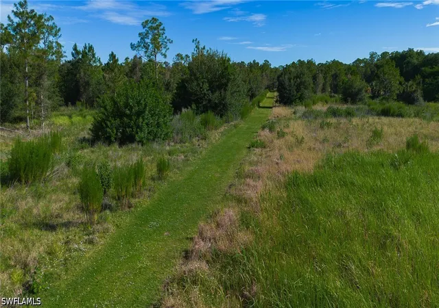 Photo 3 of Land for sale at 920 Sanctuary Rd W, Naples, FL 34120 | MLS# 226023509 | Listing updated on 2026-07-18