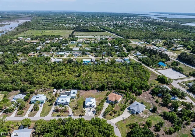 50th image of 10810 Habitat Cir, Bokeelia, FL 33922 | MLS# 2026027610