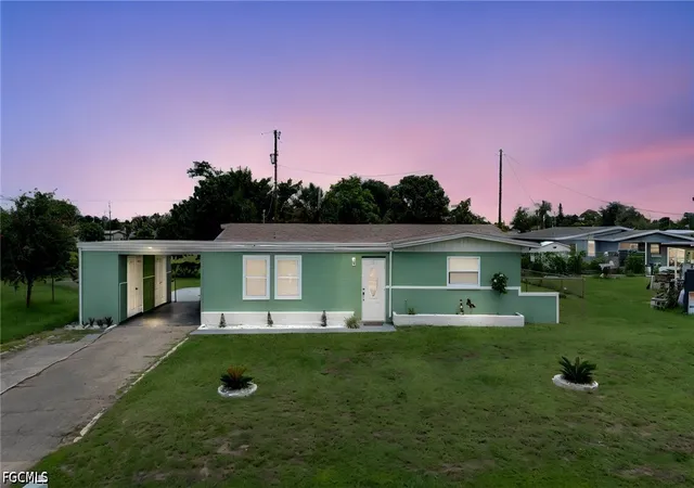 Photo 1 of Single family home for sale at 102 Oleander Rd, Lehigh Acres, FL 33936 | MLS# 2026027639 | Listing updated on 2026-07-21