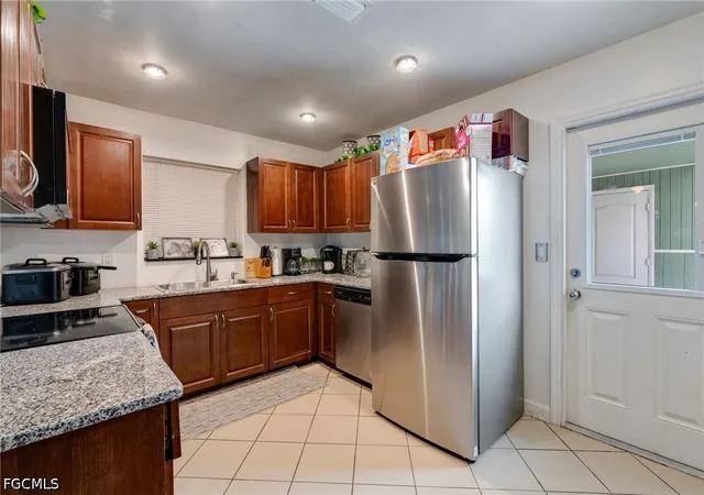 Photo 3 of Single family home for sale at 102 Oleander Rd, Lehigh Acres, FL 33936 | MLS# 2026027639 | Listing updated on 2026-07-21