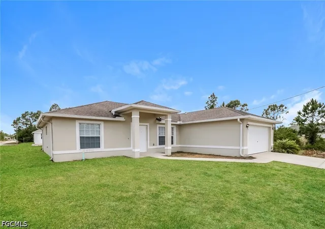 2nd image of 3201 42nd St Sw, Lehigh Acres, FL 33976 | MLS# 2026027887