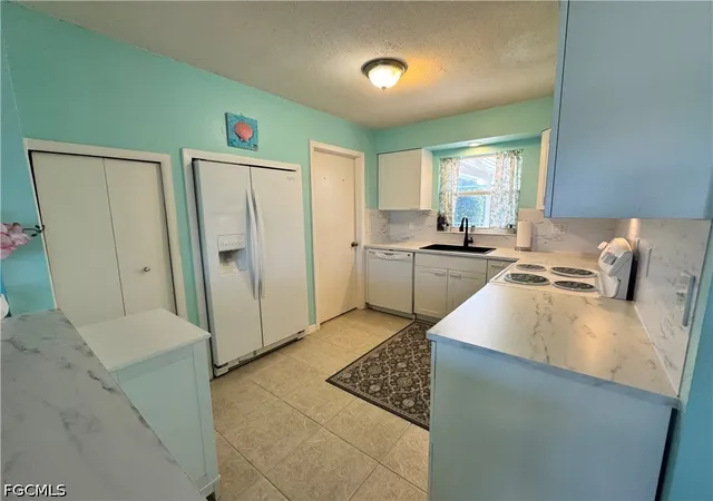 Photo 3 of Single family home for sale at 1027 Se 17th Avenue, Cape Coral, FL 33990 | MLS# 2026027967 | Listing updated on 2026-07-17