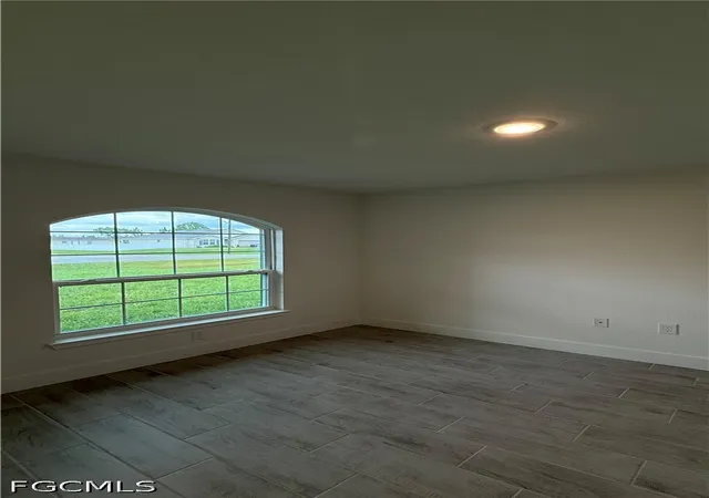 Photo 3 of Single family home for sale at 563 Windermere Dr, Lehigh Acres, FL 33972 | MLS# 2026028018 | Listing updated on 2026-07-21