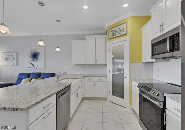 Photo 3 of Townhouse for sale at 1519 NE 8th Place, Cape Coral, FL 33909 | MLS# 2026028142 | Listing updated on 2026-06-30