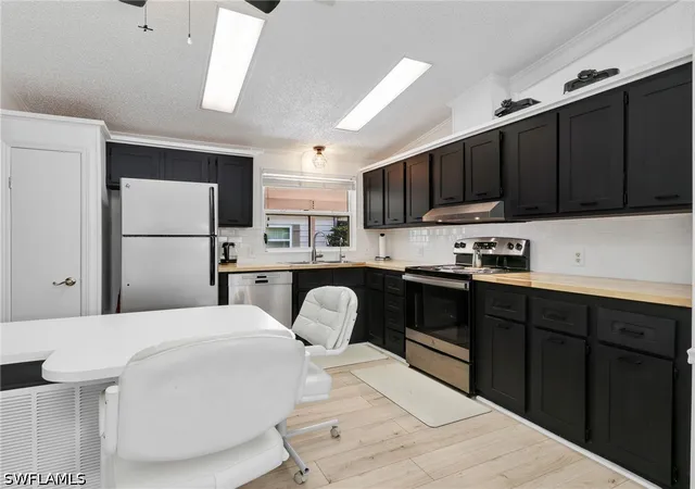 Photo 2 of Manufactured home for sale at 58 Oceans Blvd #58, Naples, FL 34104 | MLS# 226022917 | Listing updated on 2026-09-24