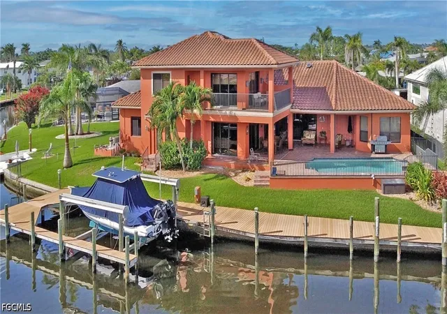 Photo 1 of Single family home for sale at 447 Avalon Dr, Cape Coral, FL 33904 | MLS# 2026028425 | Listing updated on 2026-07-01