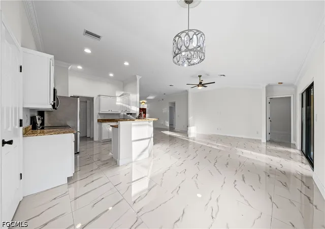 4th image of 909 Williams Ave, Lehigh Acres, FL 33972 | MLS# 2026028470