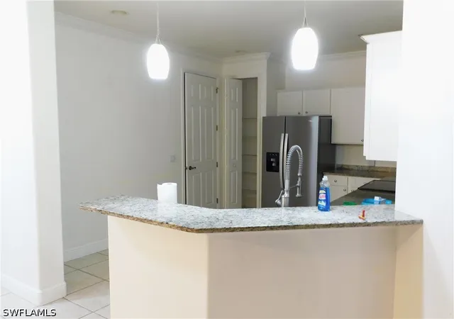 Listing Photo 5 - Condo for sale in building located at 619 SE 7th St, Cape Coral, FL 33990