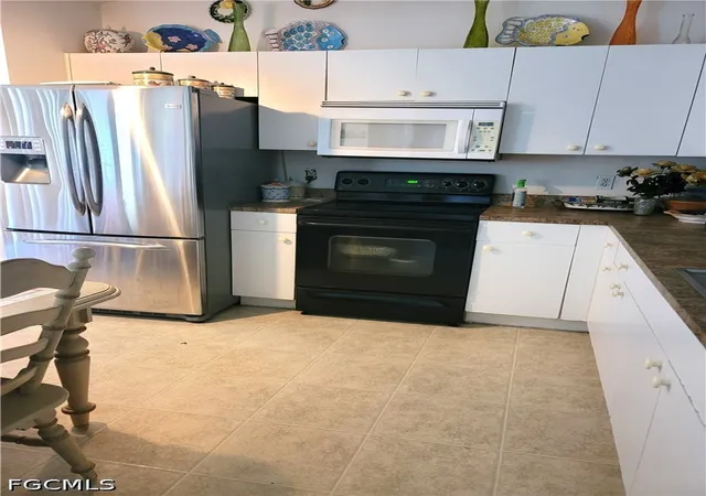 Photo 4 of Single family home for sale at 313 SW 14th Place, Cape Coral, FL 33991 | MLS# 2026028497 | Listing updated on 2026-07-07
