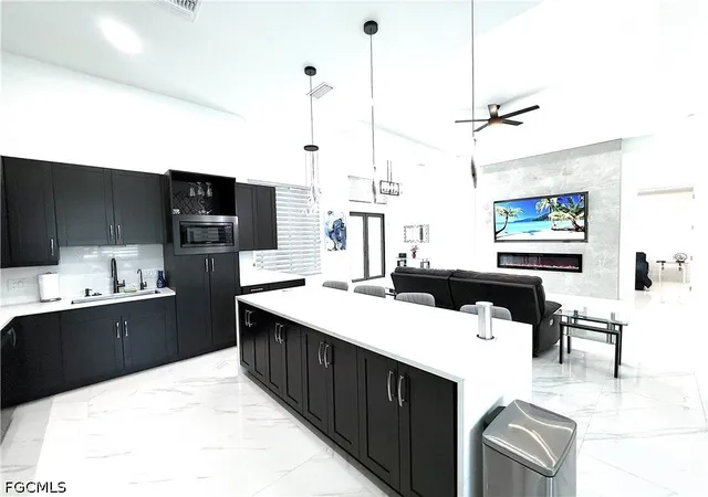 2nd image of 424 Sw 26th Ave, Cape Coral, FL 33991 | MLS# 2026028665