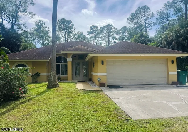 Single family home for sale at 4392 11th Avenue SW, Naples, FL 34116 | MLS# 226025324