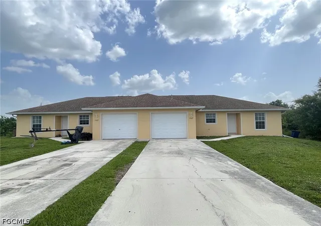 Photo 1 of Multi family home for sale at 2605/2607 Sunniland Blvd, Lehigh Acres, FL 33971 | MLS# 2026029622 | Listing updated on 2026-07-15