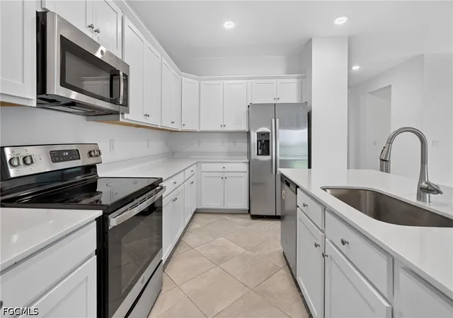 4th image of 9156 Leatherwood Loop, Lehigh Acres, FL 33936 | MLS# 2026029710