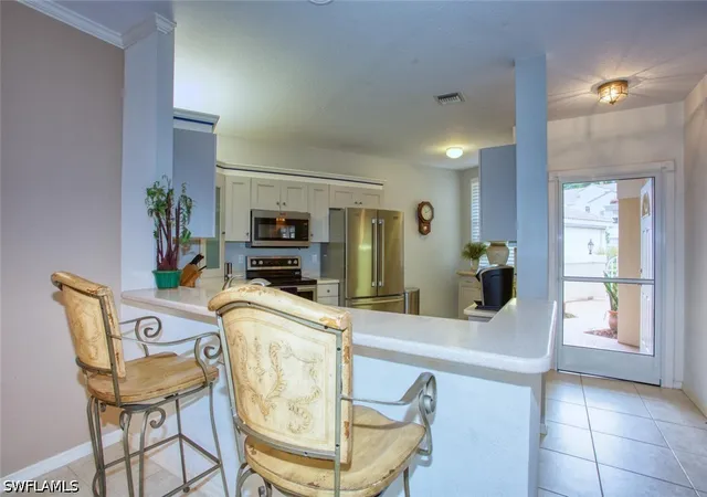 4th image of 8365 Excalibur Cir, Naples, FL 34108