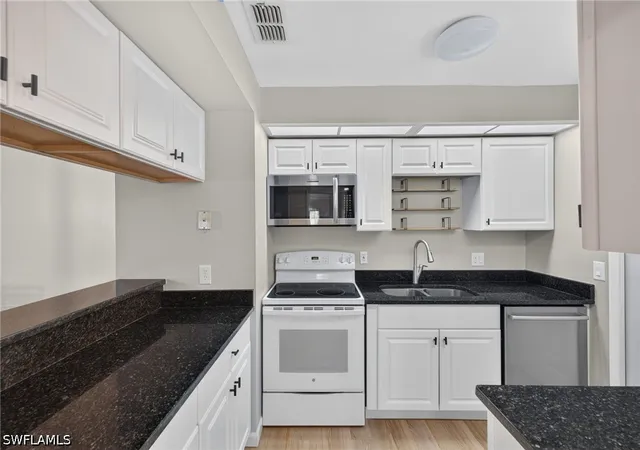 Listing Photo 4 - Condo for sale in building located at 8121 S Woods Cir, Fort Myers, FL 33919 - Unit #9