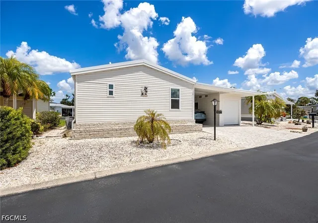 Photo 1 of Manufactured home for sale at 370 Nicklaus Blvd, North Fort Myers, FL 33903 | MLS# 2026030022 | Listing updated on 2026-07-14