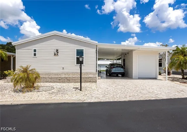 Photo 2 of Manufactured home for sale at 370 Nicklaus Blvd, North Fort Myers, FL 33903 | MLS# 2026030022 | Listing updated on 2026-07-14