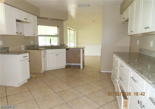 5th image of 602 Harrison Dr, Lehigh Acres, FL 33936 | MLS# 2026030041
