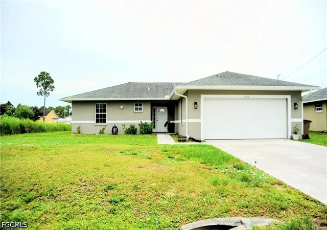 1st image of 1220 Cloplon St E, Lehigh Acres, FL 33974 | MLS# 2026030353