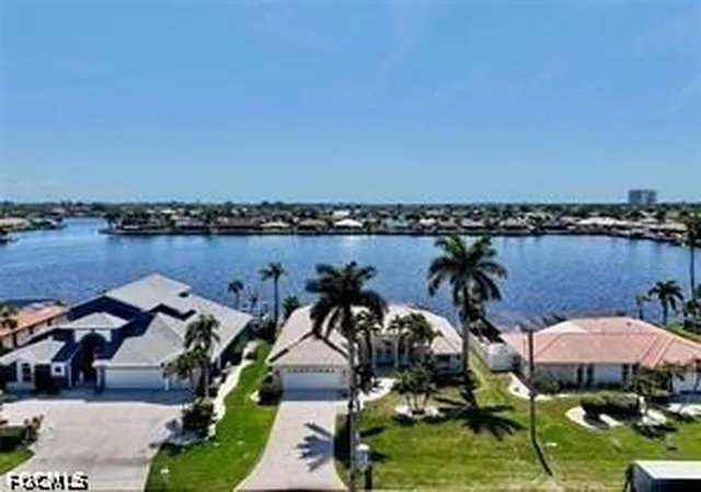 2nd image of 702 Sw 52nd St, Cape Coral, FL 33914 | MLS# 2026030382
