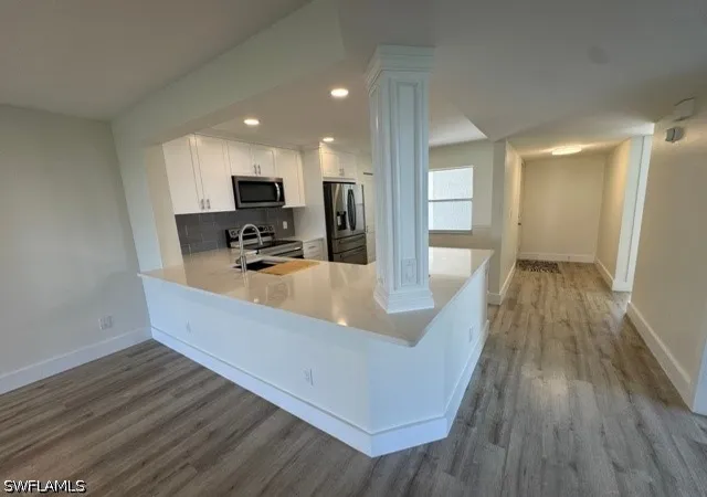 Listing Photo 4 - Condo for sale in building located at 1344 Derbyshire Ct, Naples, FL 34116 - Unit #D-101
