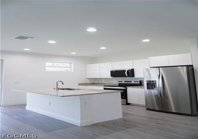 Photo 3 of Single family home for sale at 3004 47th Street W, Lehigh Acres, FL 33971 | MLS# 2026030468 | Listing updated on 2026-07-27