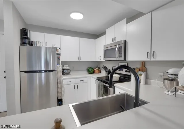Listing Photo 5 - Condo for sale in building located at 8304 Key Royal Cir, Naples, FL 34119 - Unit #1723