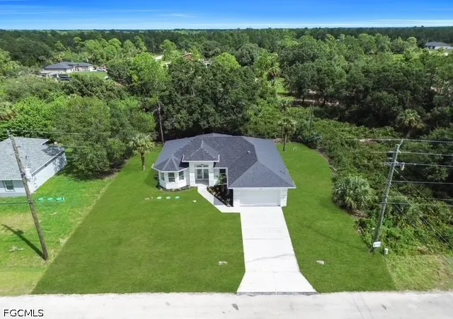 Photo 2 of Single family home for sale at 404 W 15th Street, Lehigh Acres, FL 33972 | MLS# 2026030639 | Listing updated on 2026-07-22