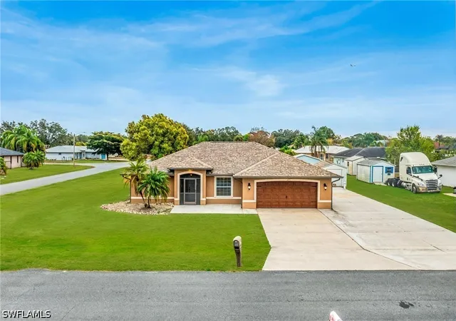 Photo 1 of Single family home for sale at 401 Candlewick Cir E, Lehigh Acres, FL 33936 | MLS# 226026515 | Listing updated on 2026-07-20