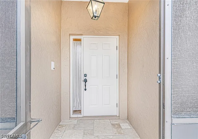 Photo 3 of Single family home for sale at 401 Candlewick Cir E, Lehigh Acres, FL 33936 | MLS# 226026515 | Listing updated on 2026-07-20